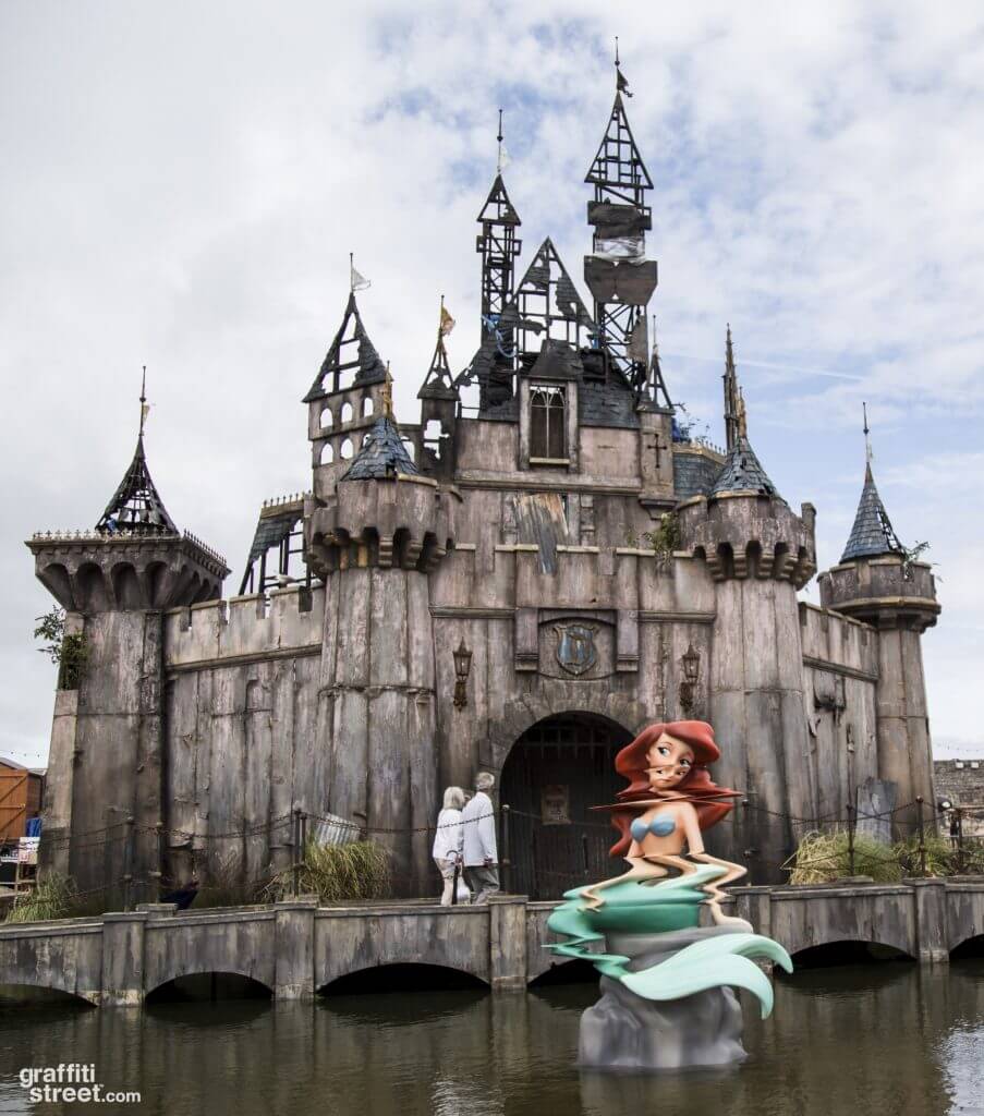 Street art activism by Banksy at Dismaland