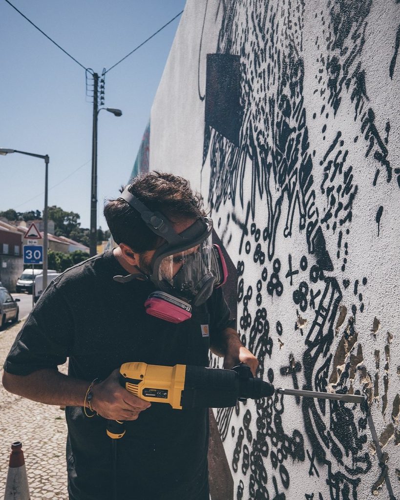 Detail of Bordalo II and Vhils collaborative mural in Chelas Lisbon