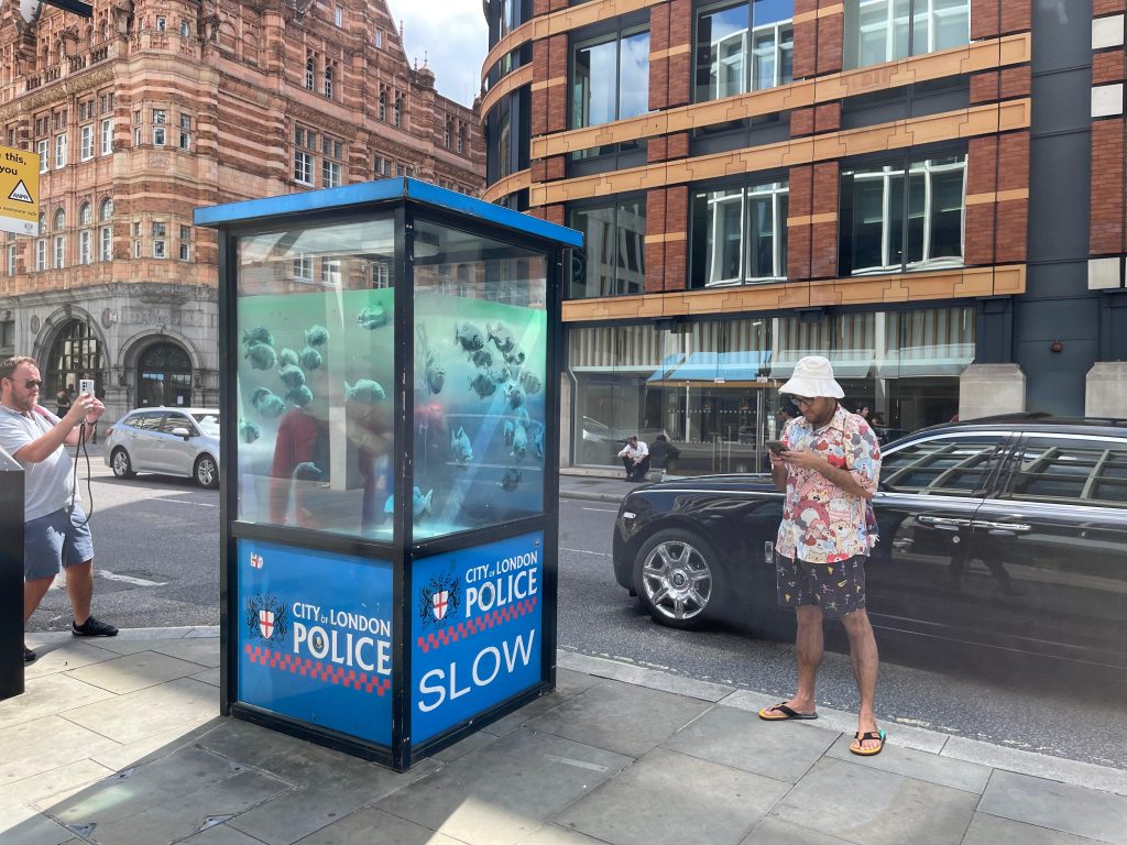 Banksy Piranhas mural on City of London police box, Ludgate Hill 2024 — GraffitiStreet