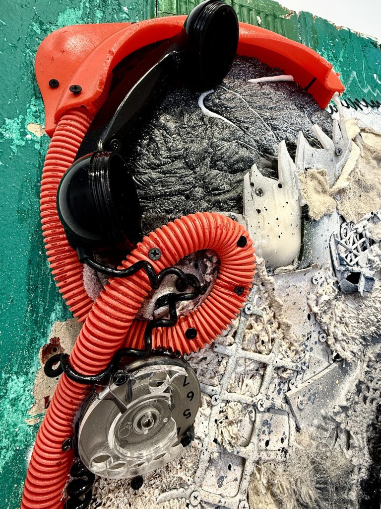 etail of Bordalo II Panda showing rotary telephone and red cable