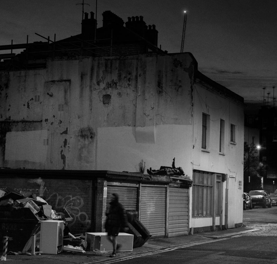 Detail of Banksy Christmas mural using urban light as a symbolic star