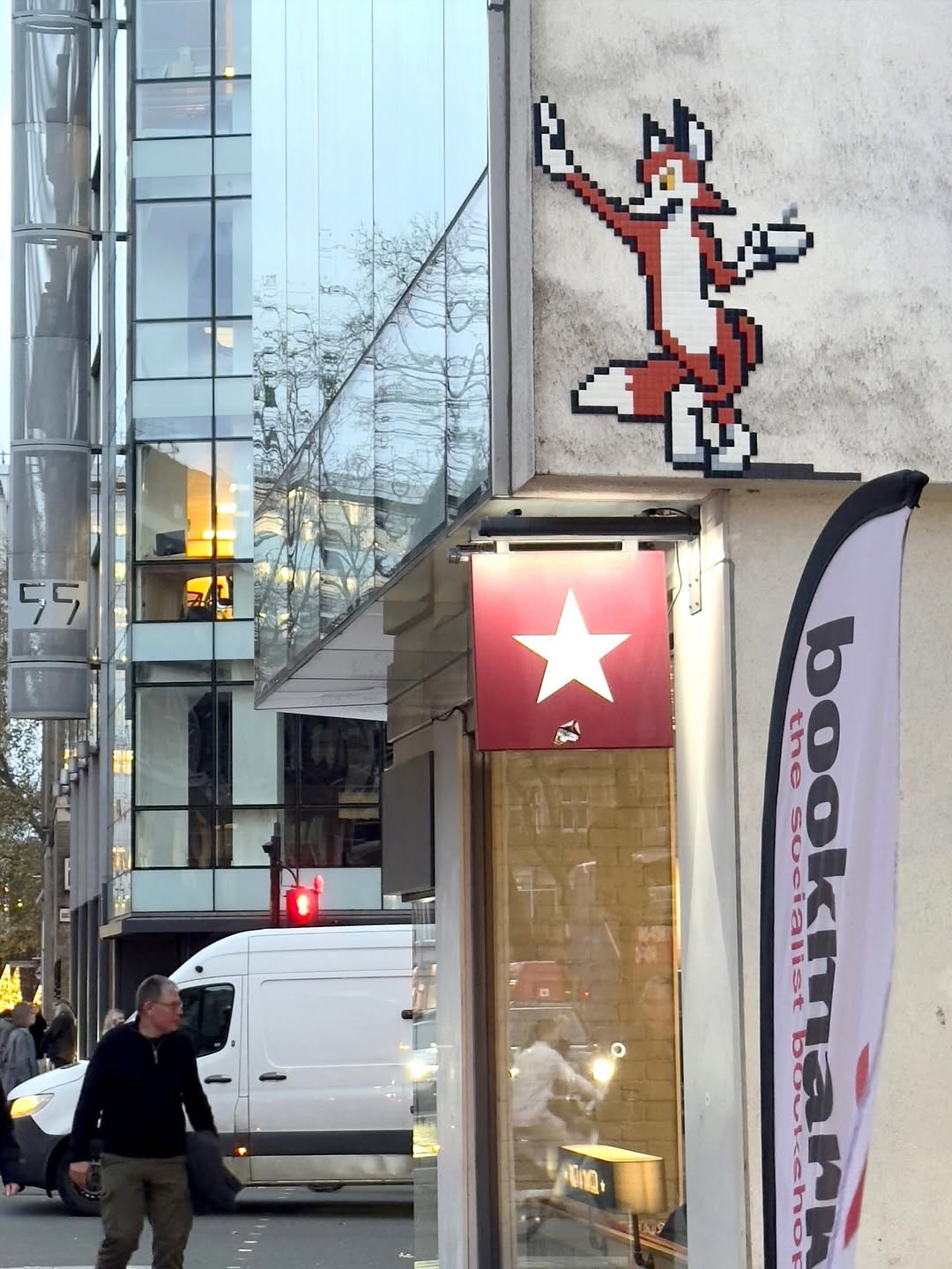 Fox mosaic from Invader London invasion beside London coffee shop
