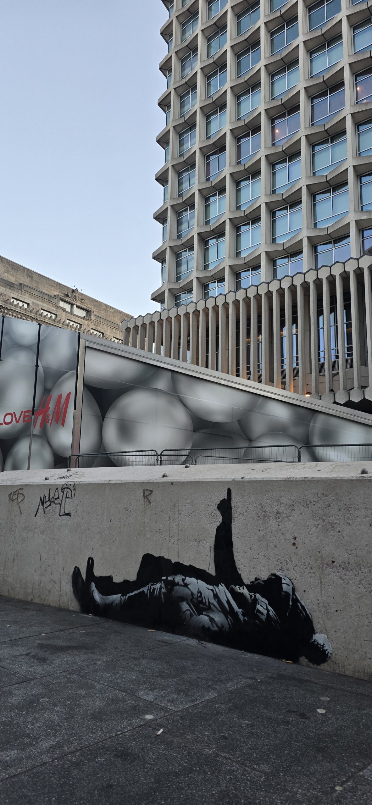 Detail of Banksy Christmas mural London with Christmas bauble cloud
