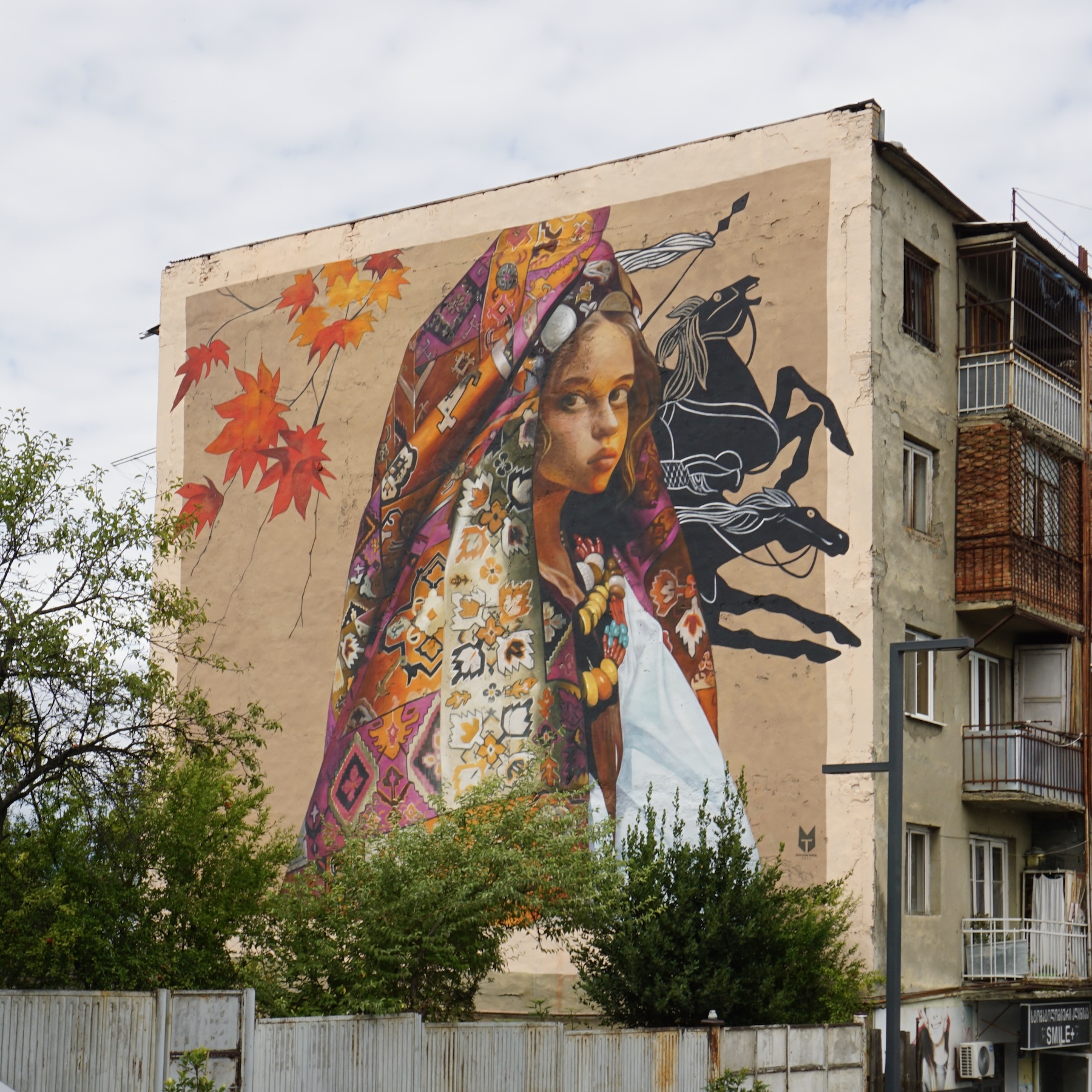 TMF Studio mural Autumn Tale at Tbilisi Mural Fest 2025 in Gurjaani