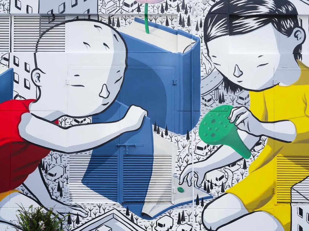 Detail of Millo The Book of Life mural Shanghai watering can and cityscape