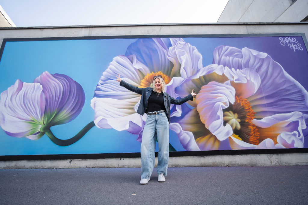 Sophie Mess mural Reims street perspective with floral artwork in Reims