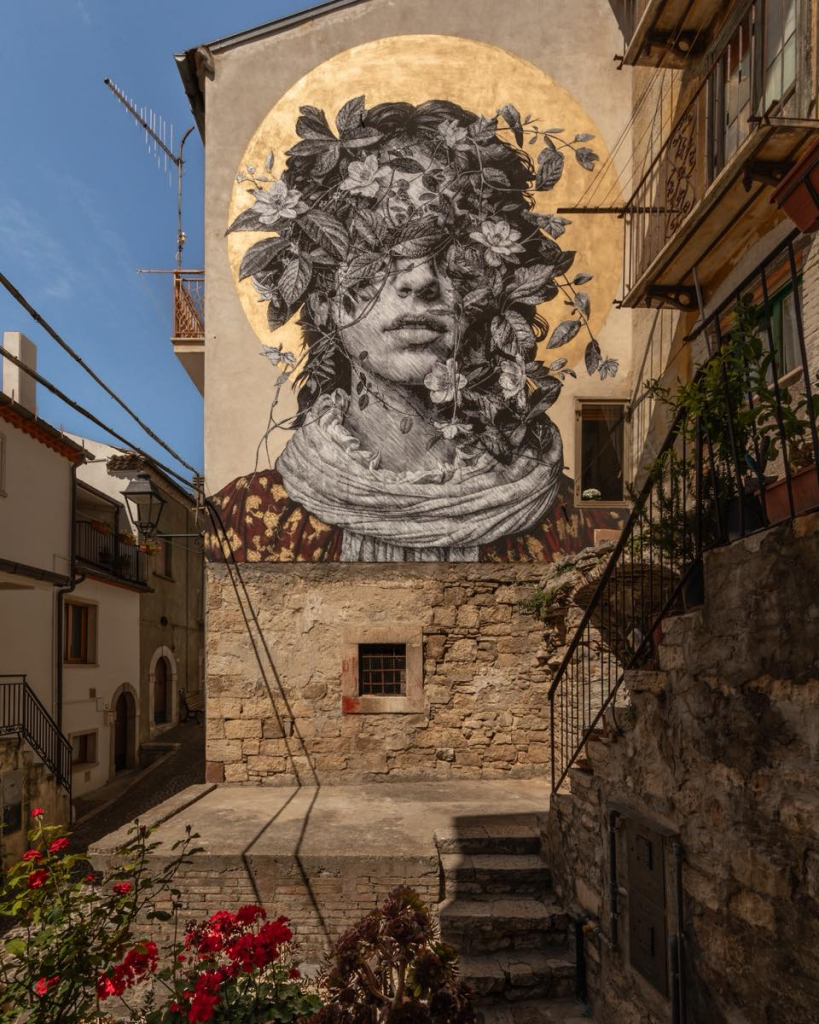 Snik After Dawn mural at CVTÀ Street Fest 2024 in Italy