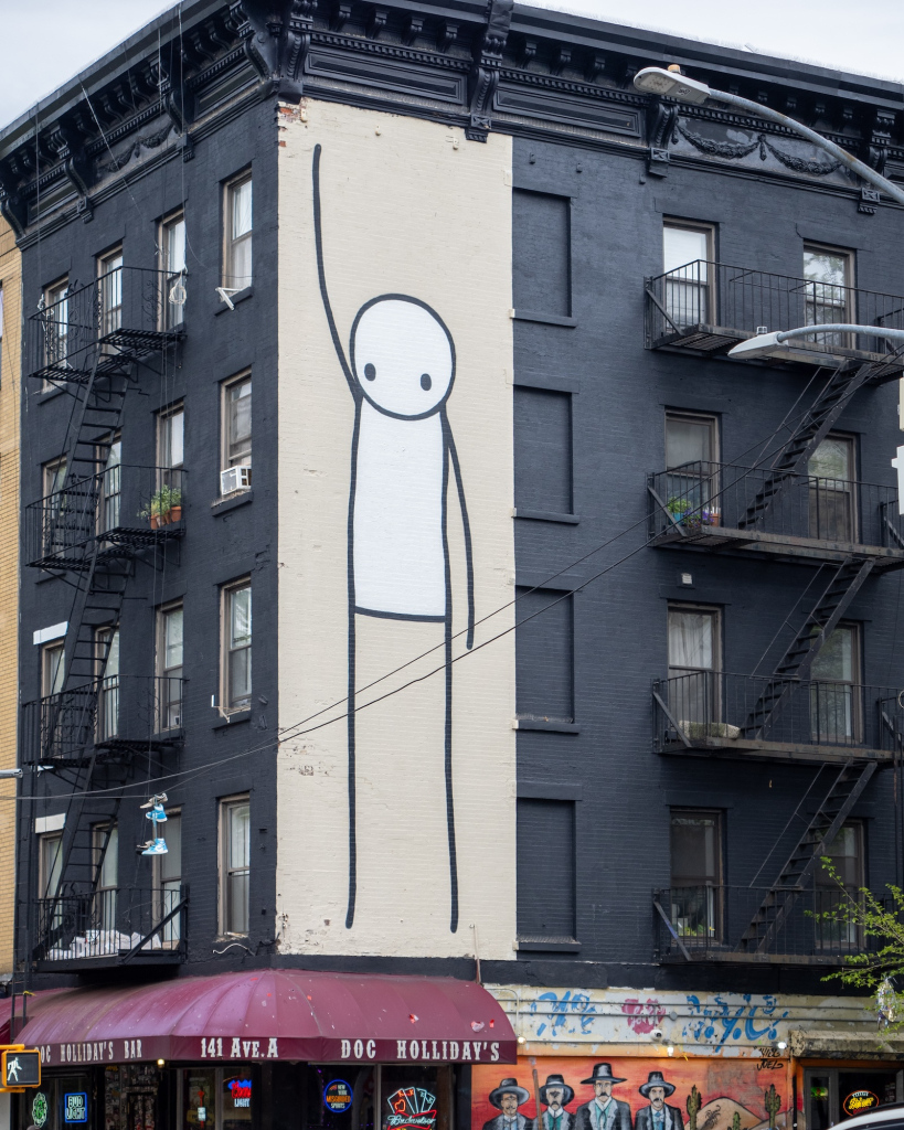 STIK Liberty mural raised arm power salute detail